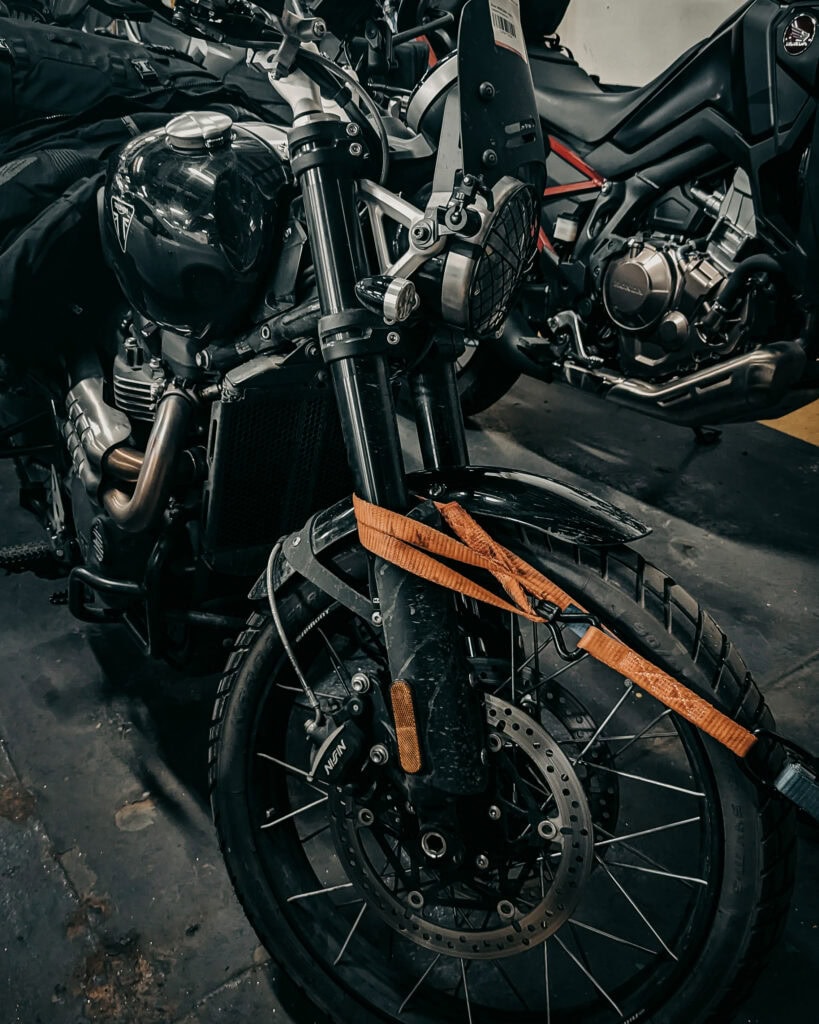 Adventure motorcycle with rugged tires and gear for off-road exploration.