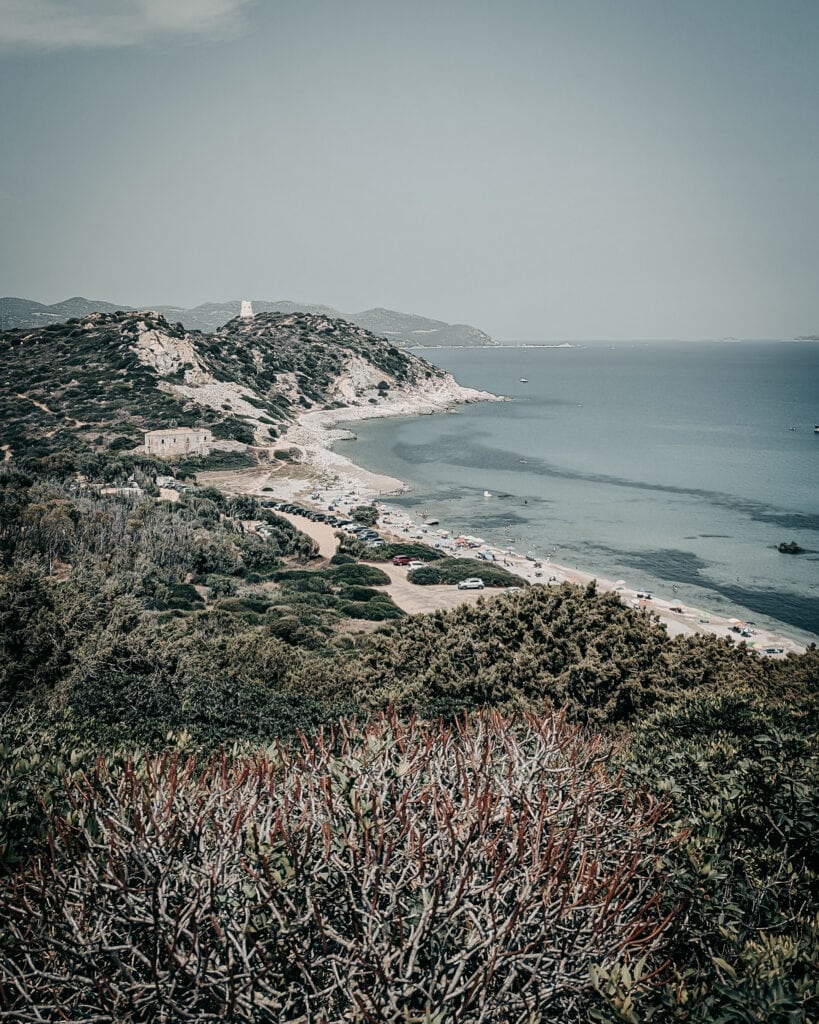 Beautiful coastal landscape with hills, beach, and ocean view from FromScramblerWithLove.